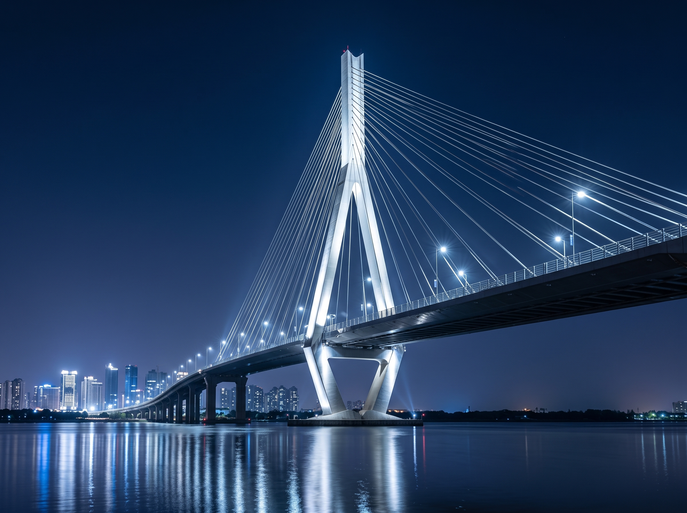 Illuminated cable-stayed bridge at night